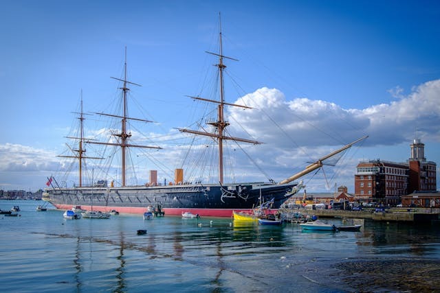 A boat docked in a harbor at Portsmouth, New England